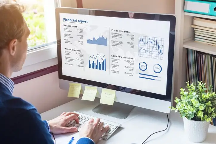 Businessman working on Financial Report of corporate operations